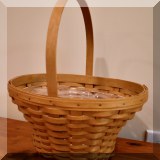 D76. Longaberger Basket with handle and plastic insert. - $22 
